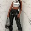 Fashion Nova Black Ice Zippered Flare Pants - Black